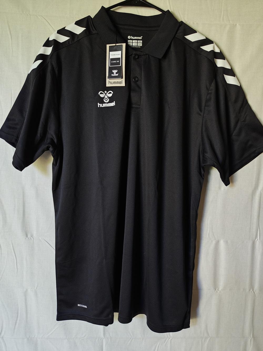 Hummel Black Polo with White Chevron Accents